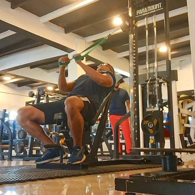 Cable machine exercise during Faith n Muscle coaching session